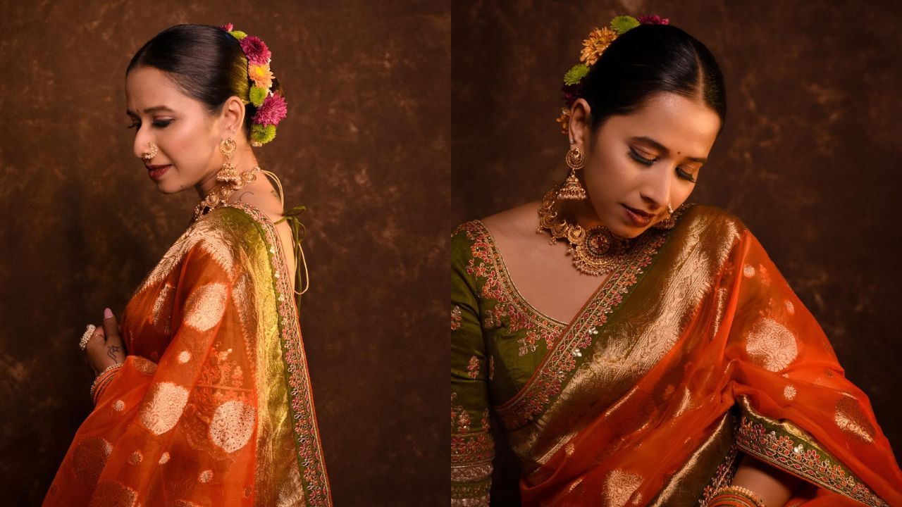 स्मोकी मेकअप, डार्क रेड लिपस्टिक असा लूक करून तिने आपली फॅशन केली आहे.