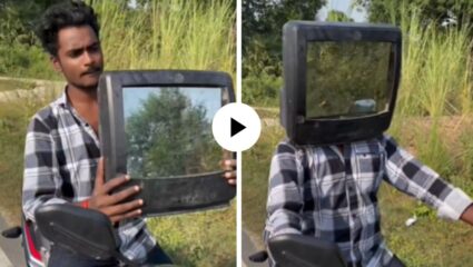 अरे बापरे! तरुणाच्या जुगाडाने सर्वच हादरले, हेल्मेट मिळाला नाही म्हणून चक्क टीव्ही लावला डोक्यावर… Video Viral