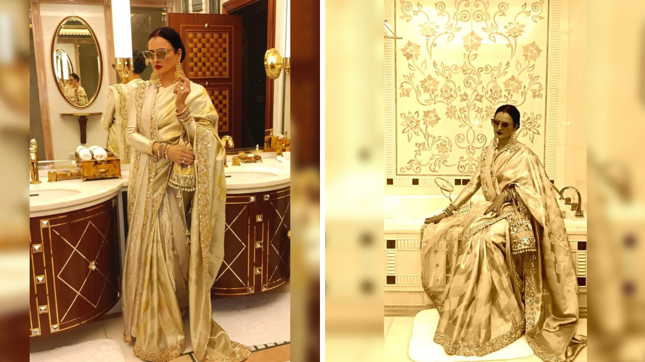 यासह रेखाने त्याच रंगाचा बटवा कॅरी केला आहे आणि गोल्डन एम्ब्रॉयडरी त्यावर कोरण्यात आली आहे. रेखा नेहमीच साडीसह योग्य मॅचिंग पोटली घेताना दिसून येते