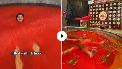 बाप रे! चीनमध्ये लोक मिरचीच्या पाण्यात मारतायत डुबक्या; VIDEO पाहून नेटकरी हैराण