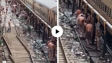 रेल्वे ट्रॅक की बाथरूम? कपडे उतरवले अन् अर्धनग्न होऊन लोकांनी ट्रेनच्या ट्रॅकवरच केली आंघोळ; अजब-गजब प्रकाराचा Video Viral