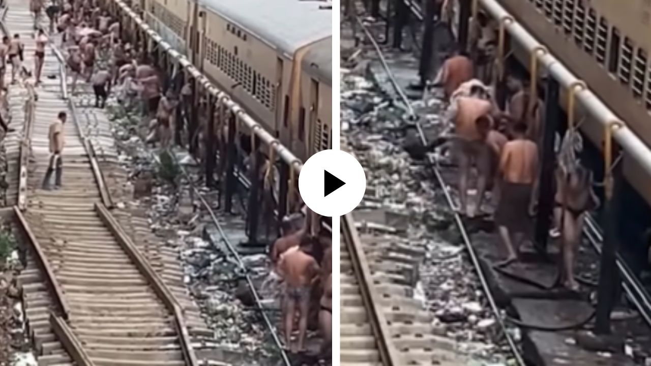 रेल्वे ट्रॅक की बाथरूम? कपडे उतरवले अन् अर्धनग्न होऊन लोकांनी ट्रेनच्या ट्रॅकवरच केली आंघोळ; अजब-गजब प्रकाराचा Video Viral