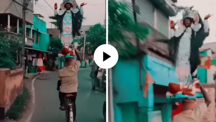 भक्तीची कमाल अन् अफलातून बॅलन्स! डोक्यावर देवीची मूर्ती ठेवून सायकलवर स्वार झाला तरुण; चकित करणारा Video Viral
